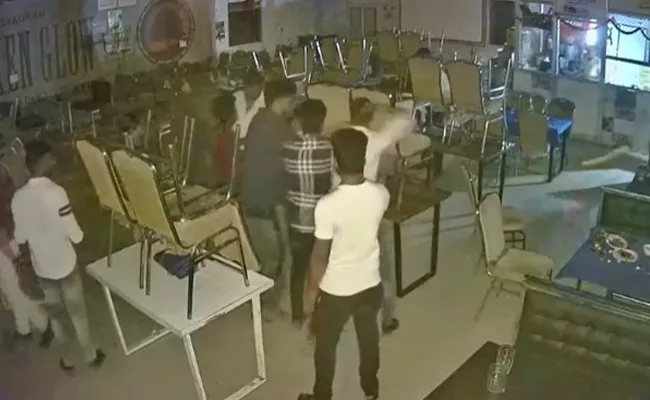 Youths Attacked On Young Man In Karimnagar - Sakshi