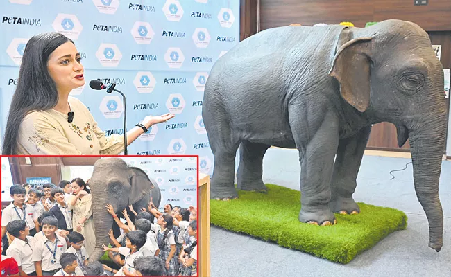 Dia Mirza Poses with Animatronic Elephant During Peta Event - Sakshi
