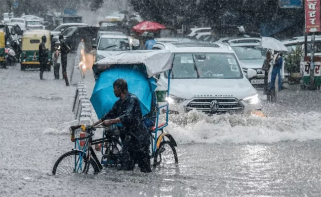 TWO More Days Heavy Rains In North India IMD Alert Issued - Sakshi