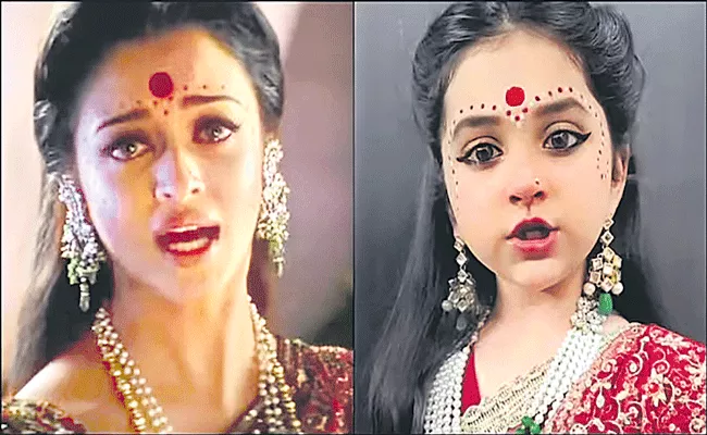 Little girl recreates scene from SRK-Aishwarya Devdas - Sakshi