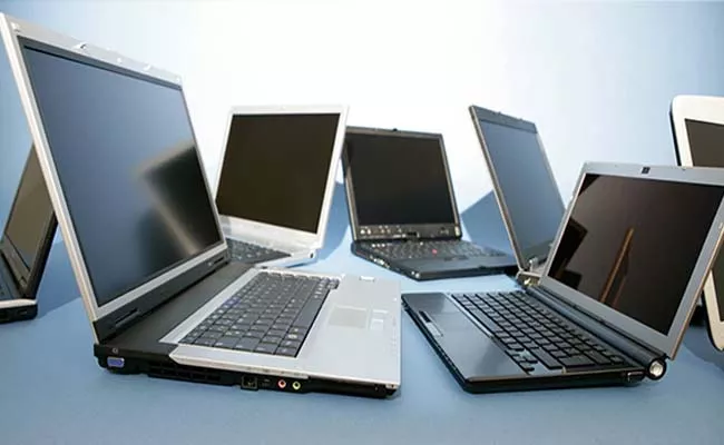 Govt restricts import of laptops tablets personal computers - Sakshi