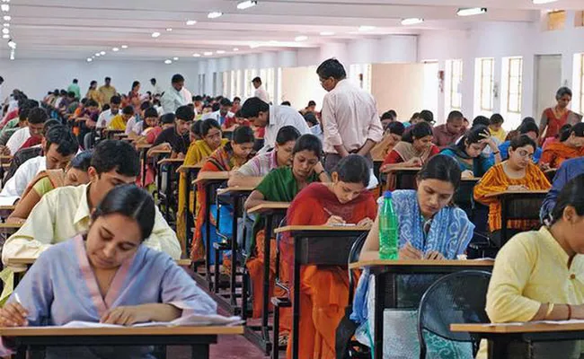 Btech Students Caught Doing Malpractice In Semester Exam Ap - Sakshi