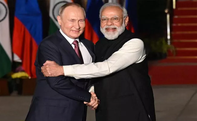 Putin praises PM Modi Make in India initiative - Sakshi