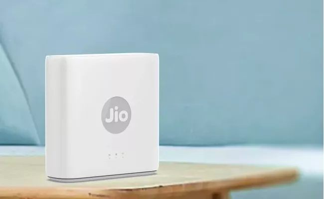 Reliance Jio AirFiber Launched in Eight Indian Cities Check Plans Benefits - Sakshi