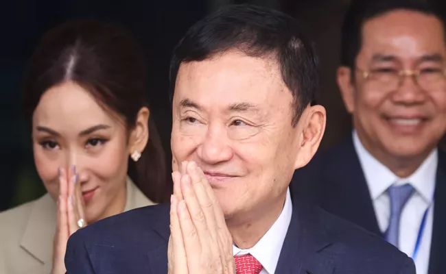 Thaiand king reduces ex-PM Thaksin 8-year prison sentence to One Year - Sakshi