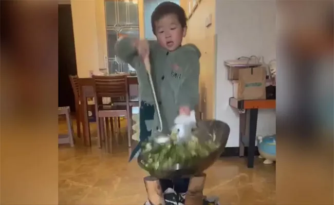 A Chinese Boy Balanced a Pan While Dancing - Sakshi