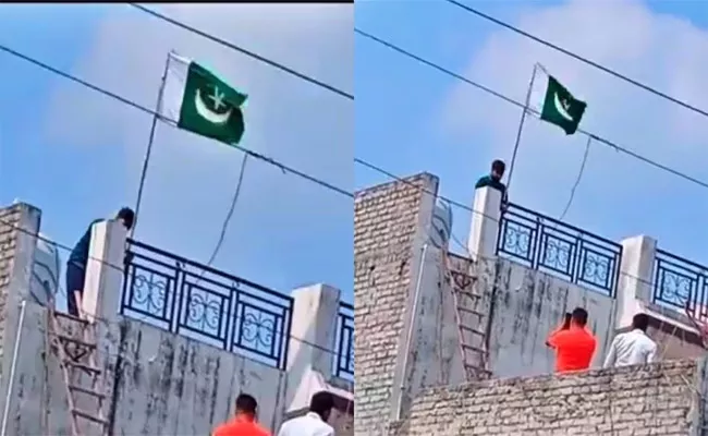 Pakistan Flag Hoisted at Home Father and Son Arrested - Sakshi