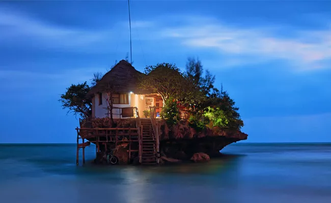 The Rock Restaurant In Tanzania Which Is In The Middile Of Ocean - Sakshi