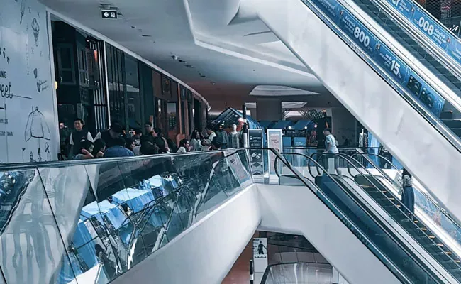 Japan Nagoya City Ban People Walking on Escalator - Sakshi