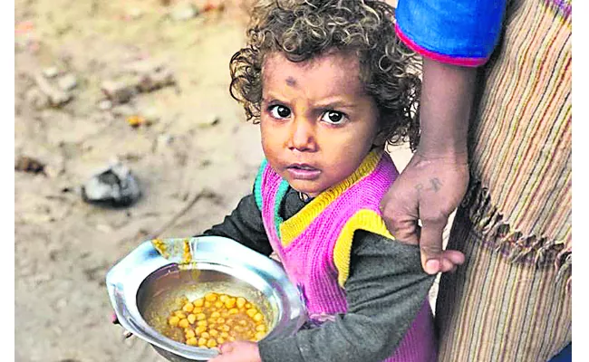 India ranks 111 out of 125 countries in Global Hunger Index - Sakshi