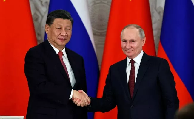 Russian President Vladimir Putin Visiting China - Sakshi
