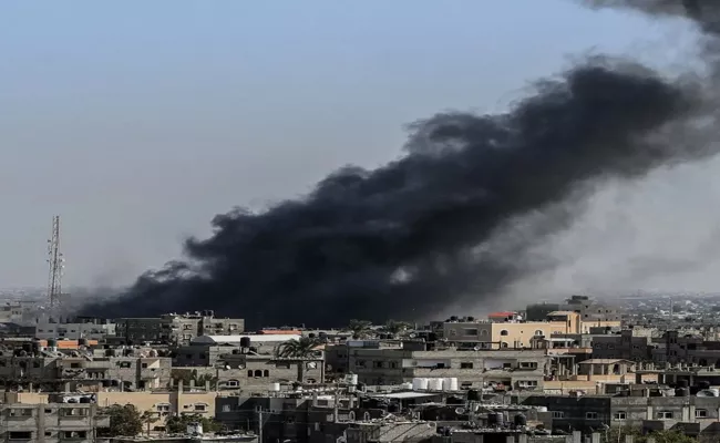 Israel-Hamas war: Israel launches airstrikes on Gaza, Syria and occupied West Bank - Sakshi