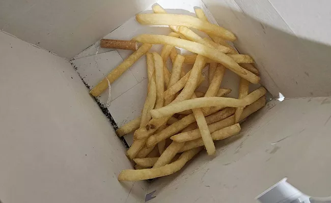 UK Woman Finds Cigarette Butt In Child Happy Meal At McDonald Shares Photo - Sakshi