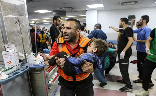 Israel-Hamas War: Israeli forces strike several Gaza hospitals in one day - Sakshi