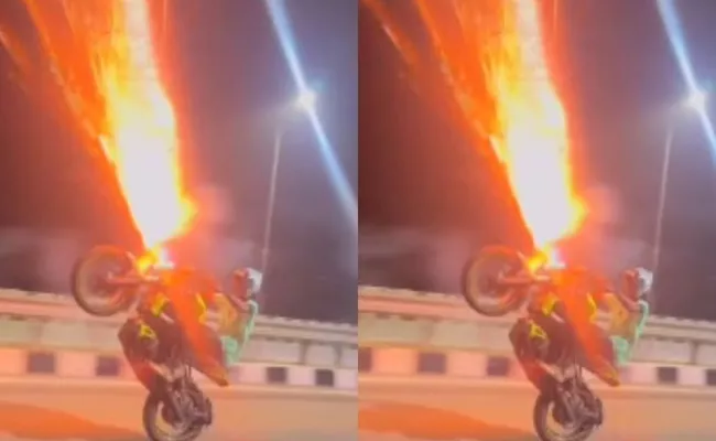 Tamil Nadu man arrested after viral video of bike stunt with firecrackers - Sakshi