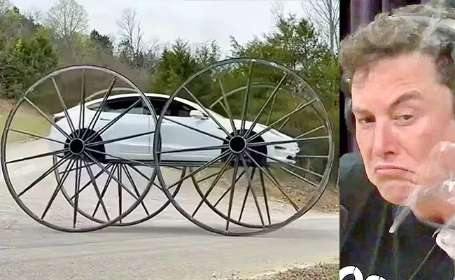 Man Installs Buggy Wheels On A Tesla And Drives It Upside Down - Sakshi