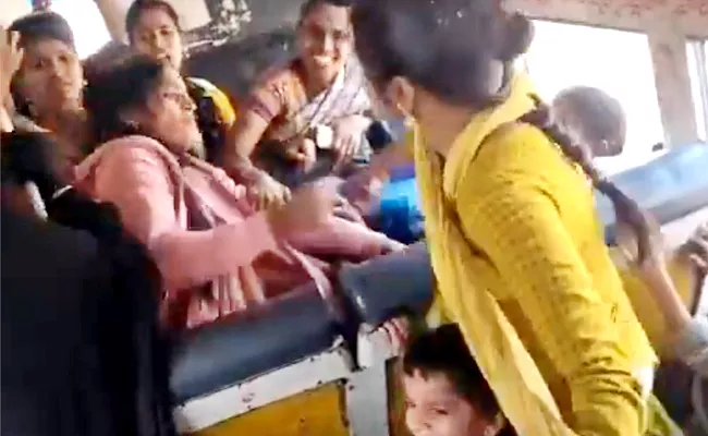 Women fight in RTC Bus for Seat Occupation - Sakshi
