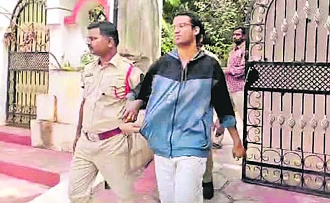 Police Case Registered Against IPS B Naveen Kumar Son in Alleged Land Grab - Sakshi