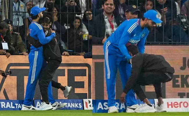 Fan Touches Virat Kohli Feet During Second T20 Match Against Afghanistan - Sakshi