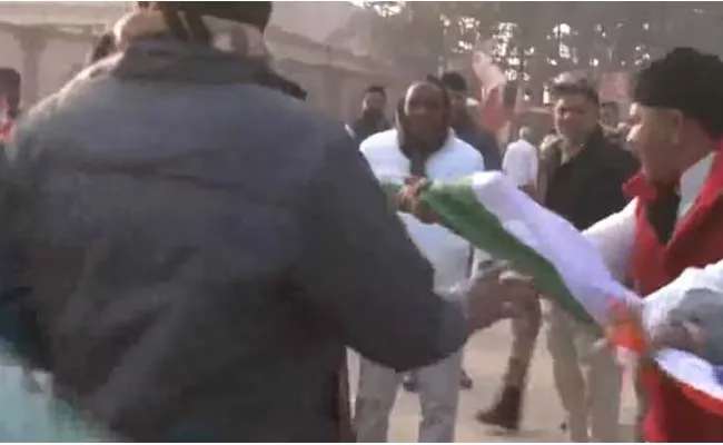 Congress Flag Damaged Outside Ram Temple In Ayodhya - Sakshi