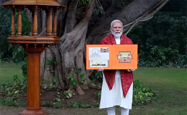PM Modi Releases Postal Stamp - Sakshi