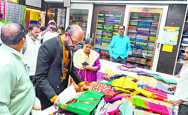 Enforcement raids on garment shops in Pochampally - Sakshi