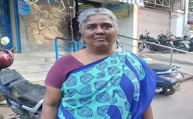 TN  Woman donates Rs 7cr land in memory of daughter gets cm reward - Sakshi