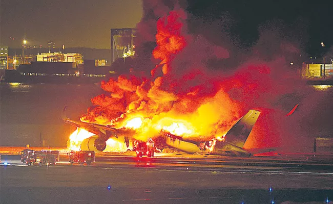 Five dead After Japan Airlines Plane Collision at Tokyo Airport - Sakshi