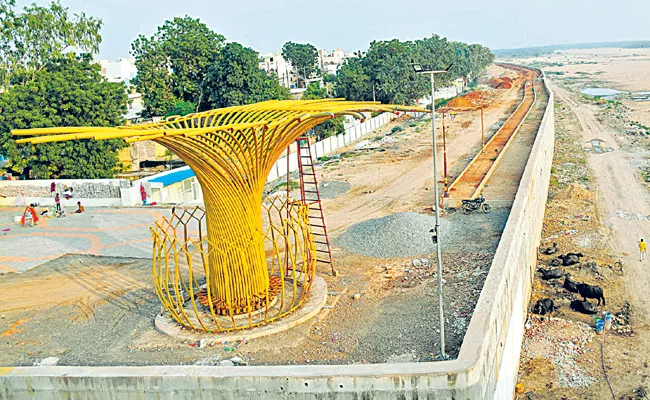 Construction of retaining wall along Krishna river - Sakshi