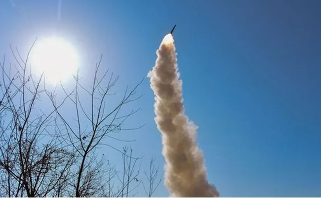 North Korea Tests Multiple Rocket Launcher System - Sakshi