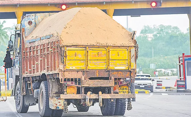 Sand lorries In Hyderabad roads - Sakshi