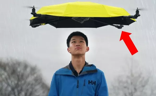 Man Builds World First Flying Umbrella - Sakshi