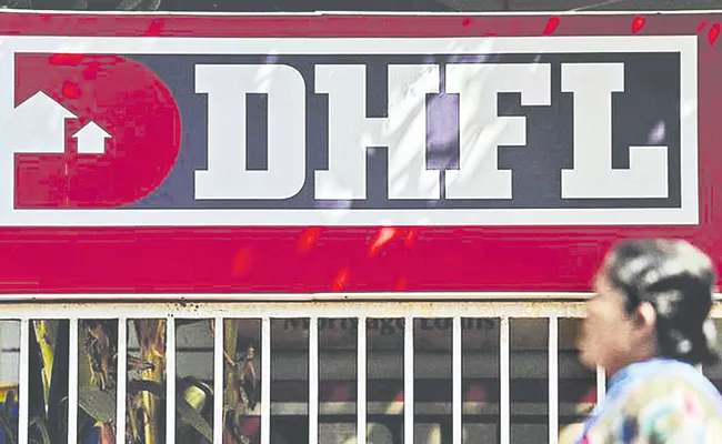 Sebi orders attachment of bank, demat accounts of DHFLs ex promoters - Sakshi