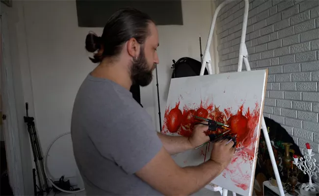 The Artist Who Creates Paintings Using 10 Brushes - Sakshi