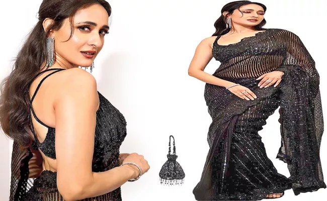 Akhanda actress Pragya Jaiswal Retro Style In Black Saree - Sakshi