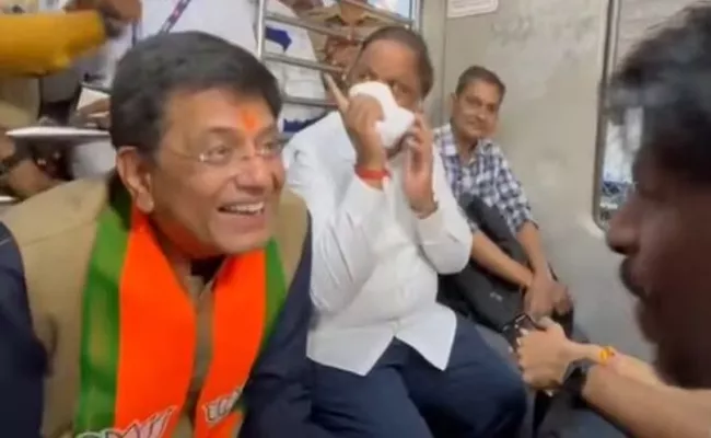 Union Minister Piyush Goyal in Mumbai Local Train Video - Sakshi