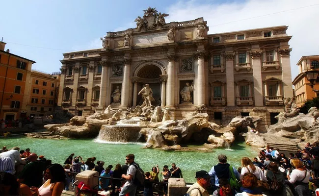 Tourists Throw Over One Million Into Italys Trevi Fountain Each Year - Sakshi
