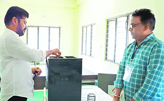 Telangana CM Revanth Reddy casts vote in Mahabubnagar MLC bypoll - Sakshi