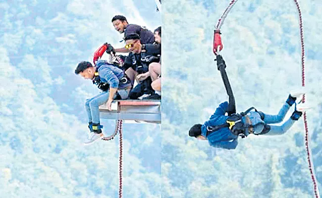 Wheelchair-bound man bungee jumps in Rishikesh - Sakshi