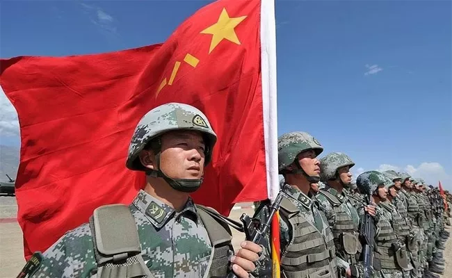 China Defence Budget Raises to 232 US Dollar - Sakshi