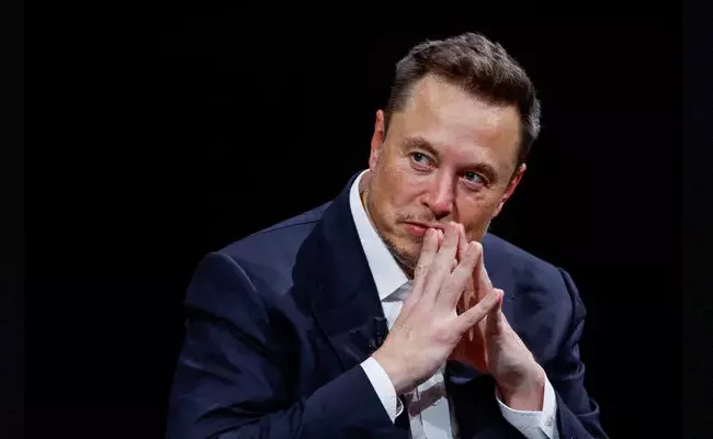 Elon Musk Loses World Richest Person Title - Sakshi