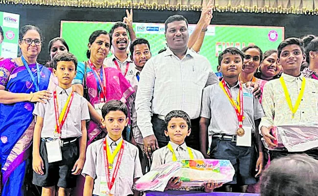 Prizes for students of NTR district in Word Power Championship - Sakshi