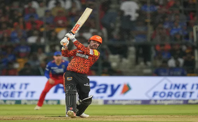 Travis Head plummets RCB bowlers, hits IPL hundred - Sakshi