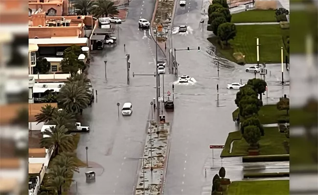 Flood Like Situation Due to Heavy Rains in Dubai - Sakshi