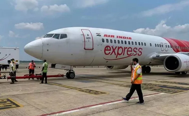 reduced flights impacting cabin crew salaries AI Express union