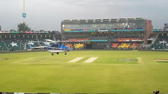 Helicopters deployed in Lahore to dry outfield before Peshawar Zalmi vs Karachi Kings match - Sakshi