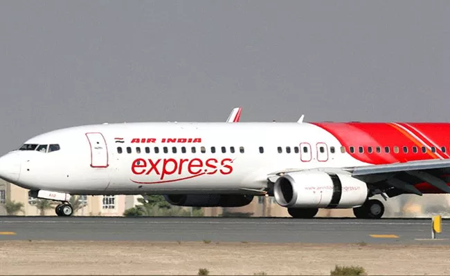  Dubai suspends Air India Express operations for COVID-19 passenger - Sakshi