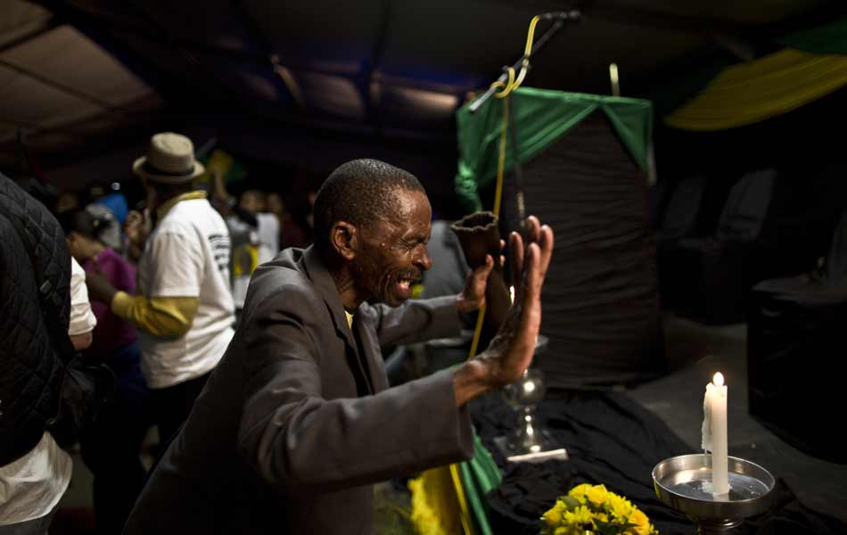 Nelson Mandela buried in the rolling hills of South Africa24