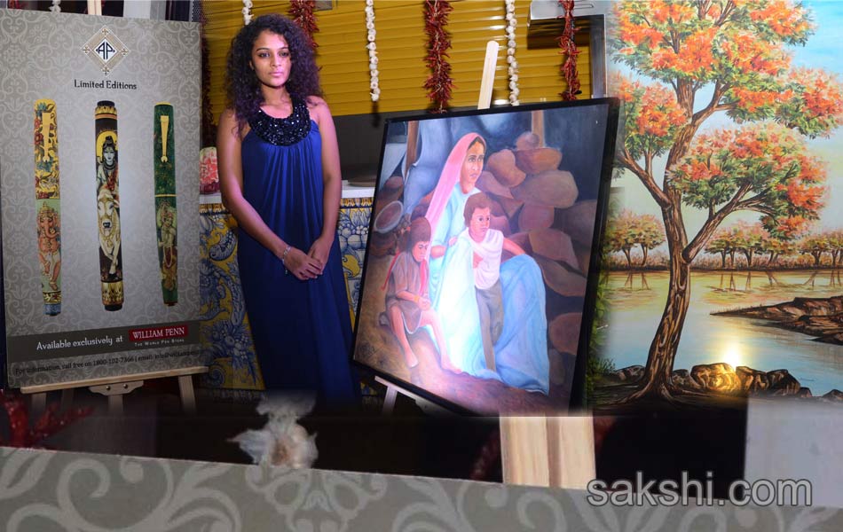 Indian mouth and foot painting artists charity auction - Sakshi3