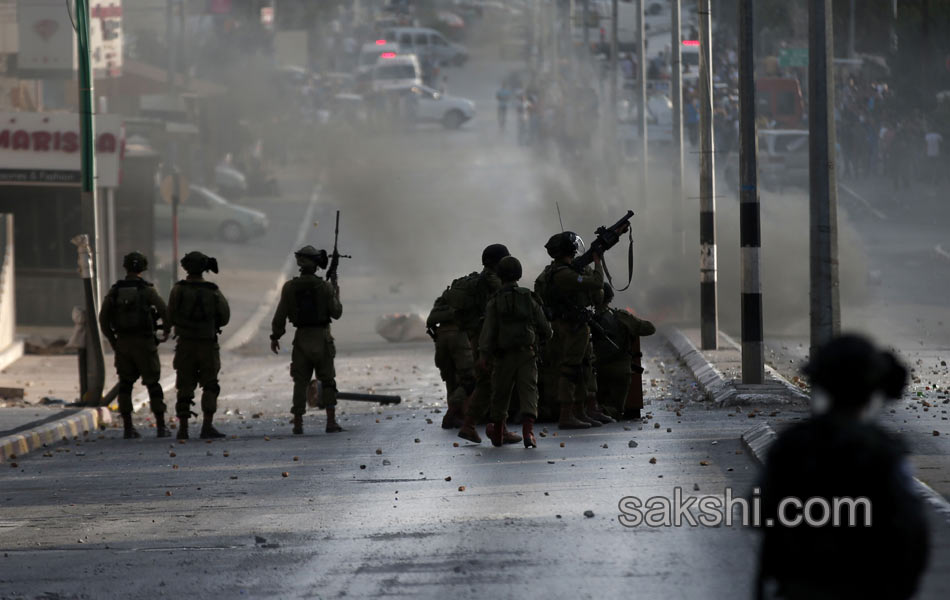 Palestinian demonstrators during clashes in the West Bank11